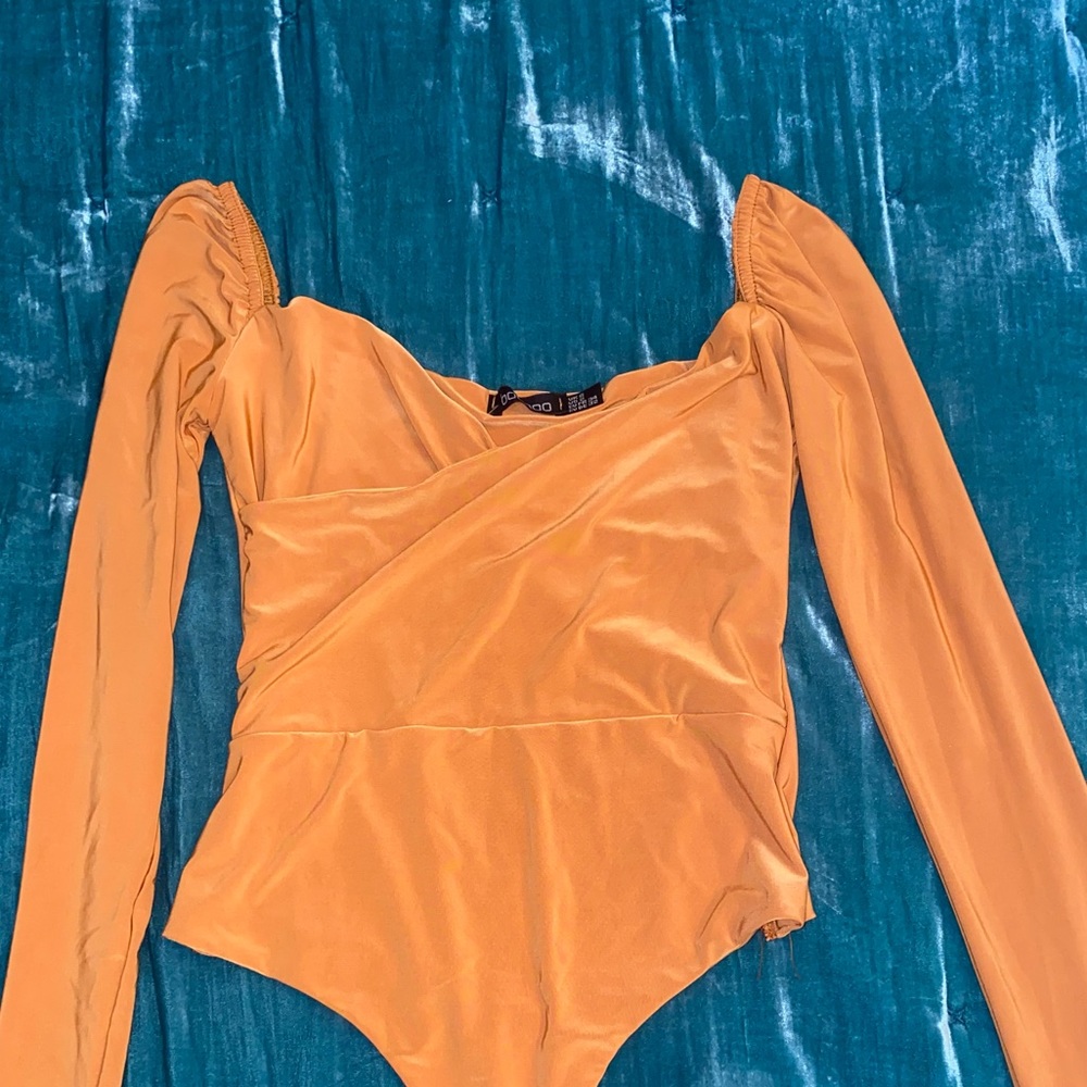 NWT!! BURNT ORANGE BODY SUIT size XS
